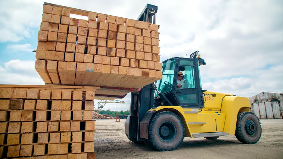 Hyster 360 high-capacity forklift with lumber load. 
