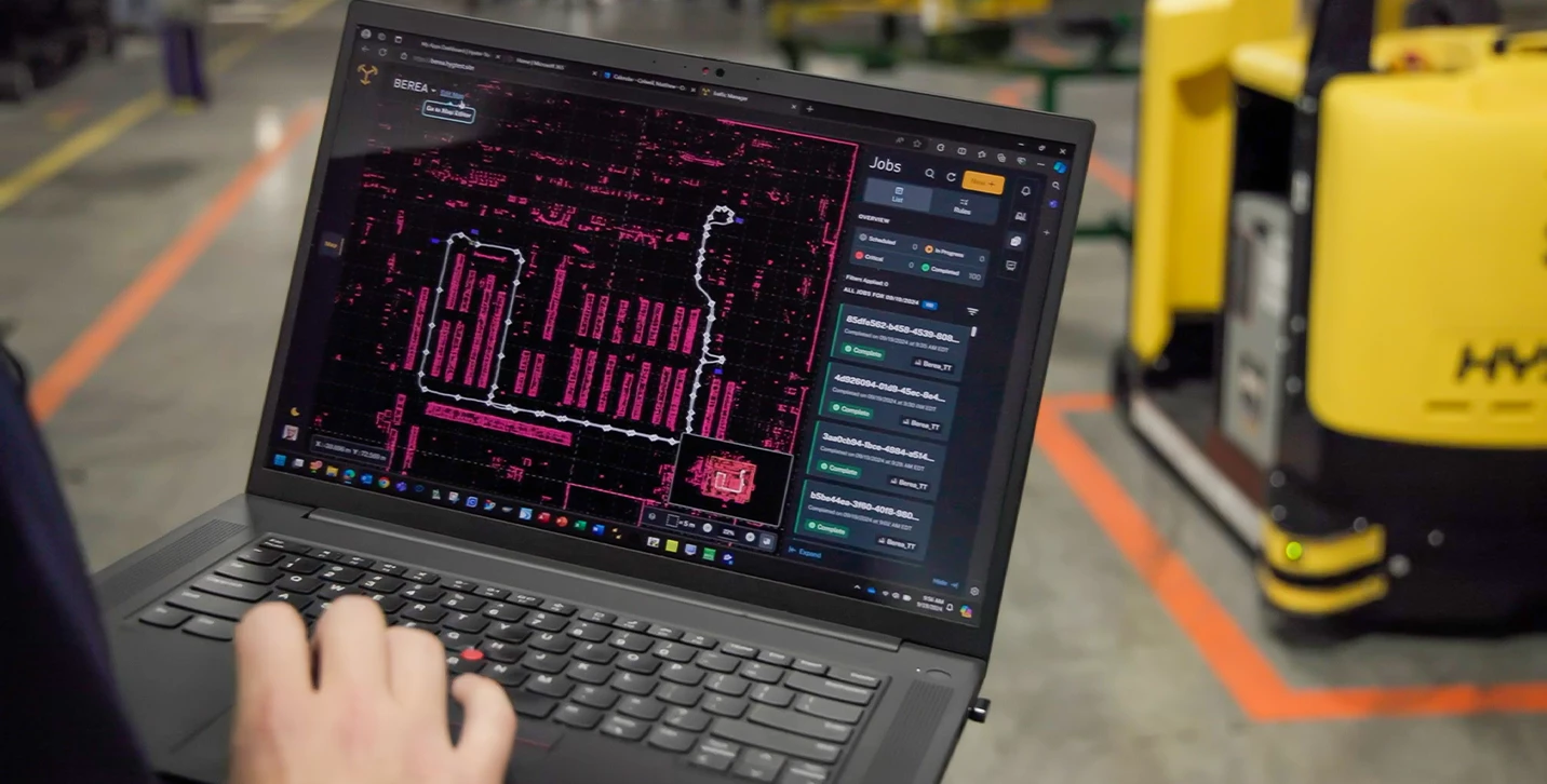 Person on Automation Portal routing a Hyster automated tow tractor.