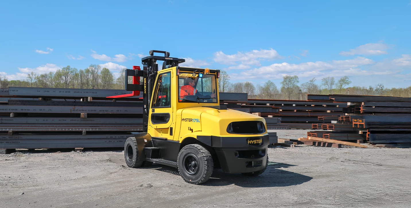 Hyster integrated lithium-ion forklift lifting steel beams