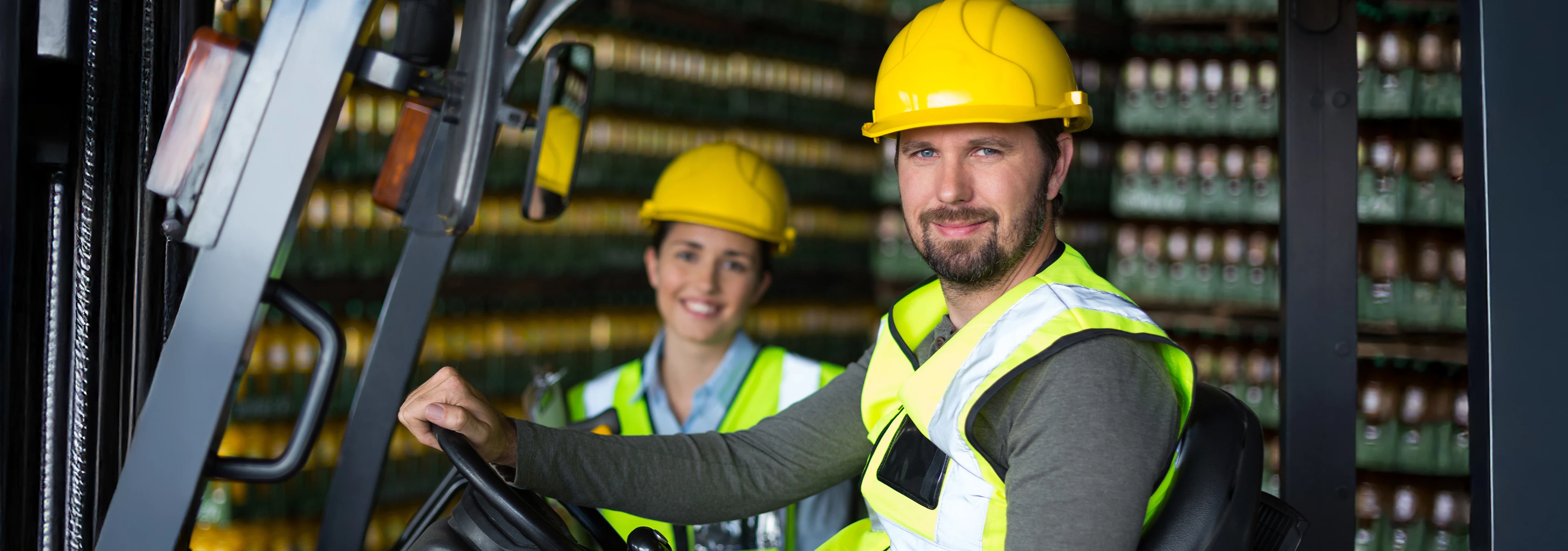 Person operating a forklift.  